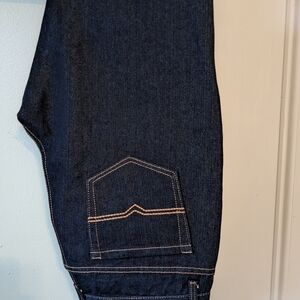 Blue Straight Jeans with Distinctive Stitching and Textured Fabric